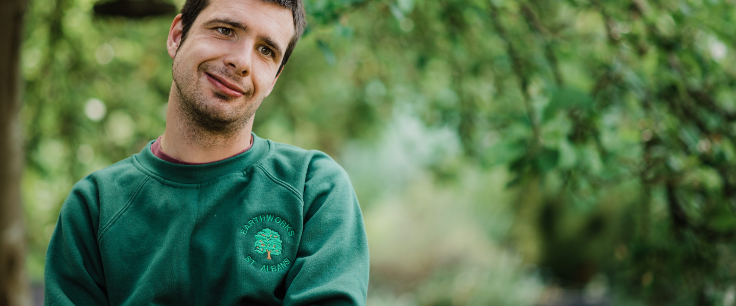 An Earthworker in our woodland looking into the camera